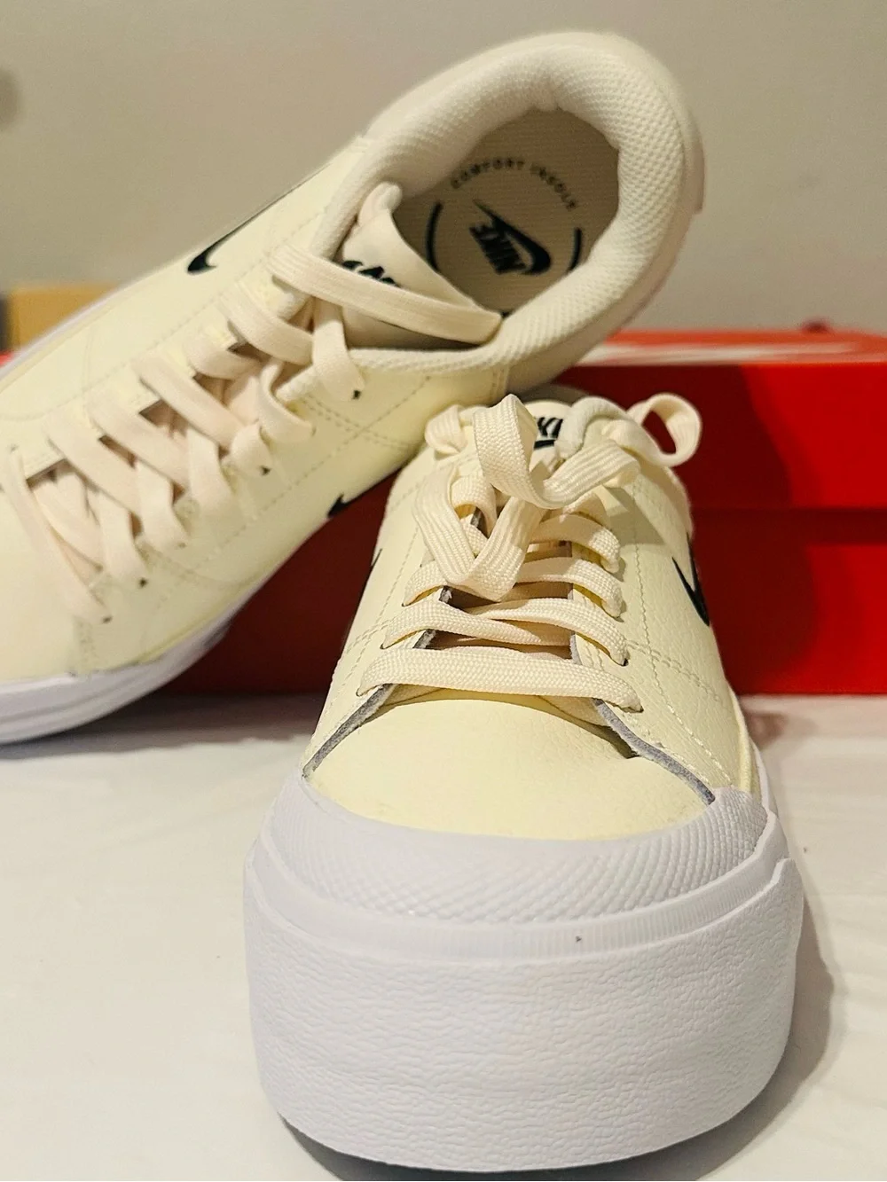 Nike Women’s Cream and Black Low-Top Platform Sneakers